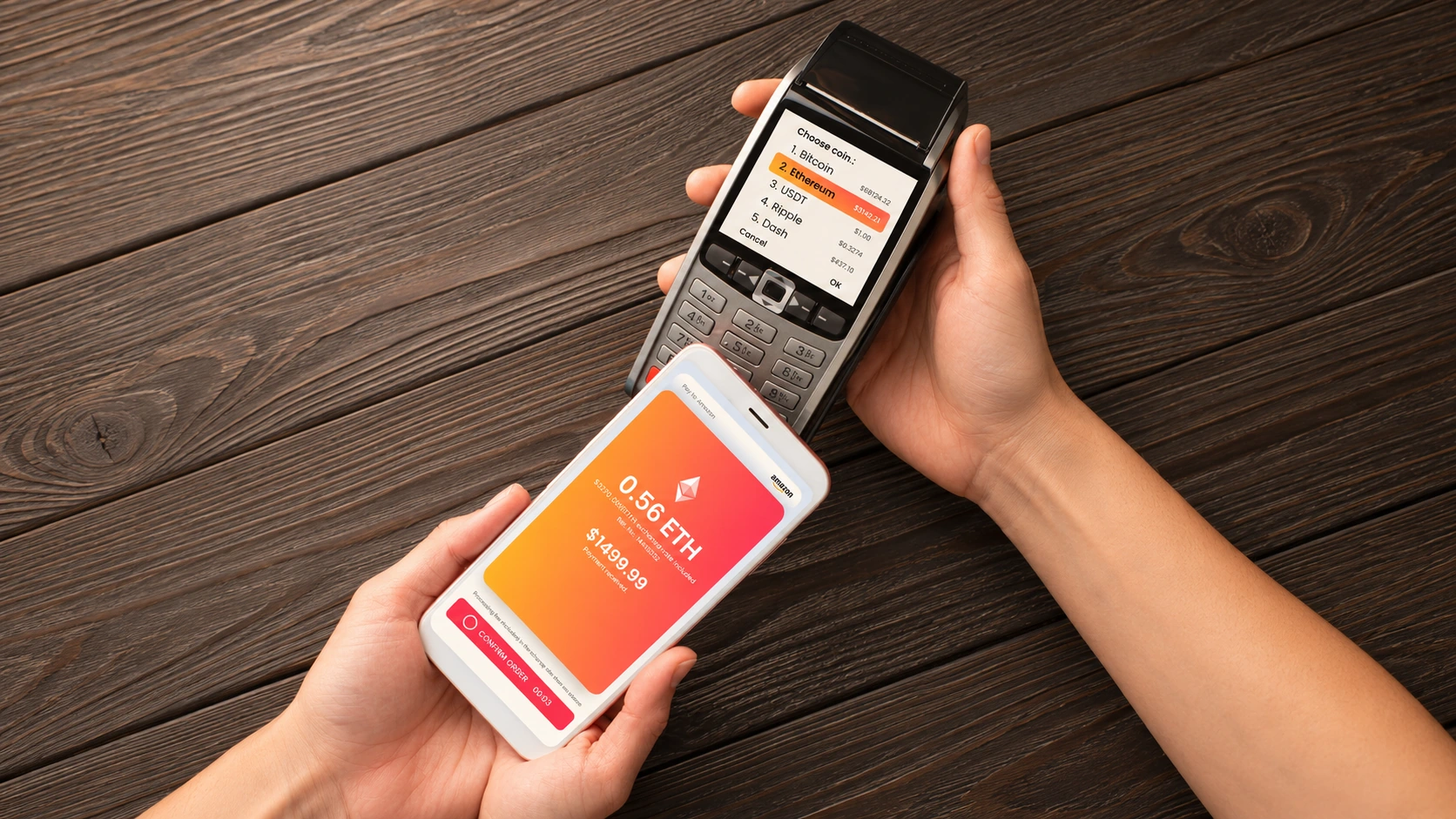 C Pay on a physical POS terminal and iPhone, held over a dark wooden counter